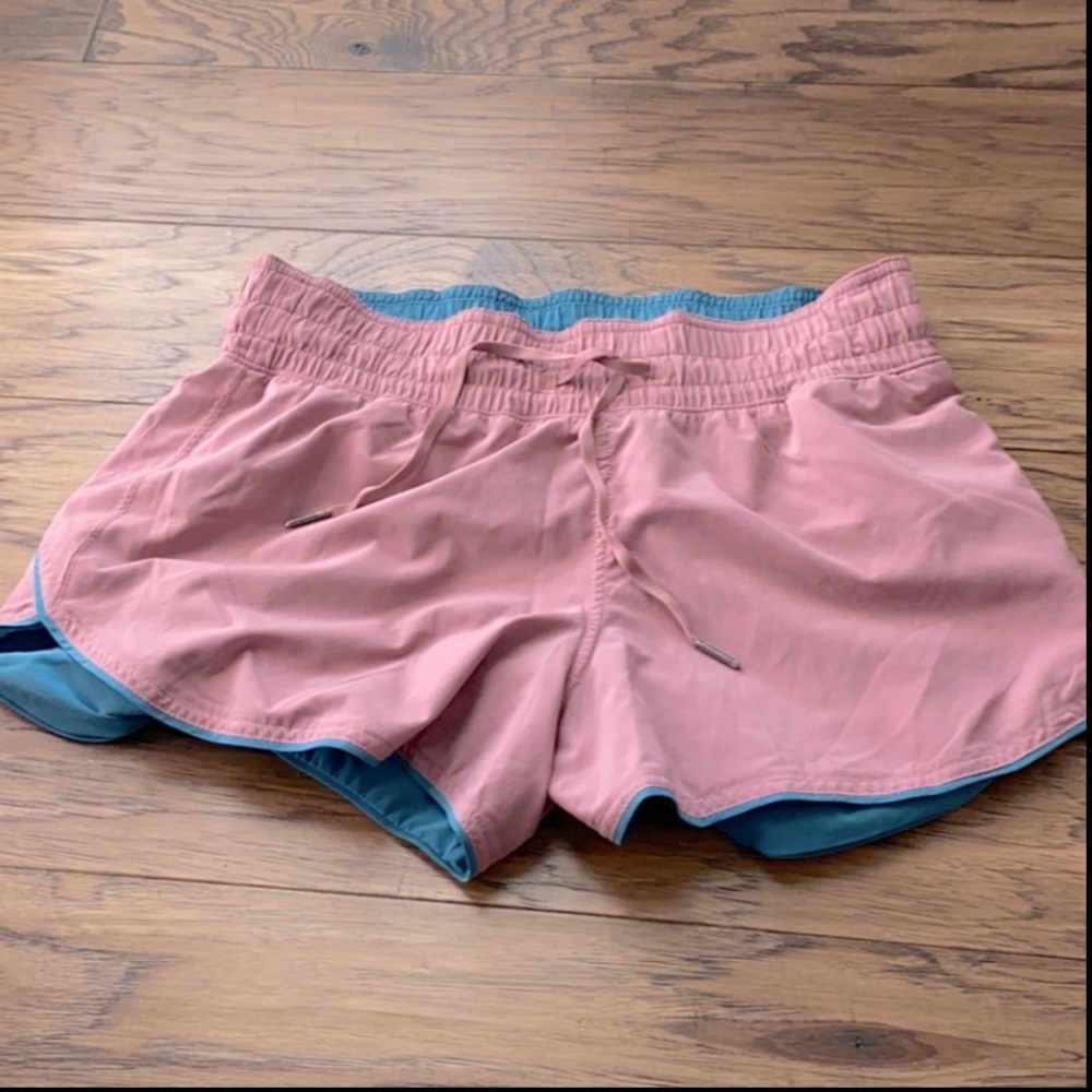 Size 6. Pink and green reversible lulu shorts.